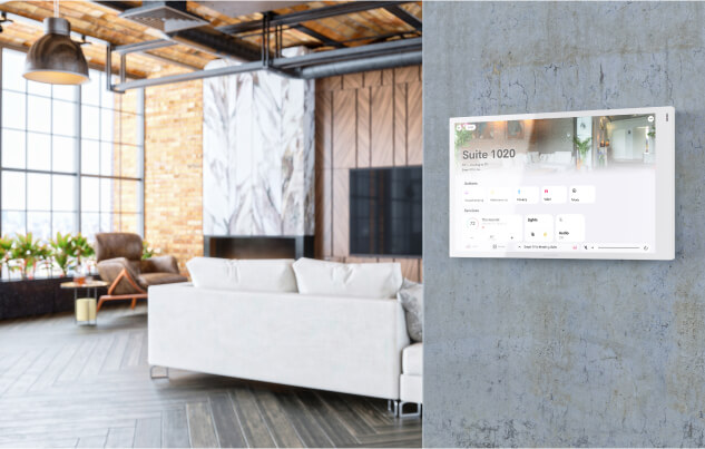 Wall-mounted hotel room control screen showing lighting, shading, temperature and media controls